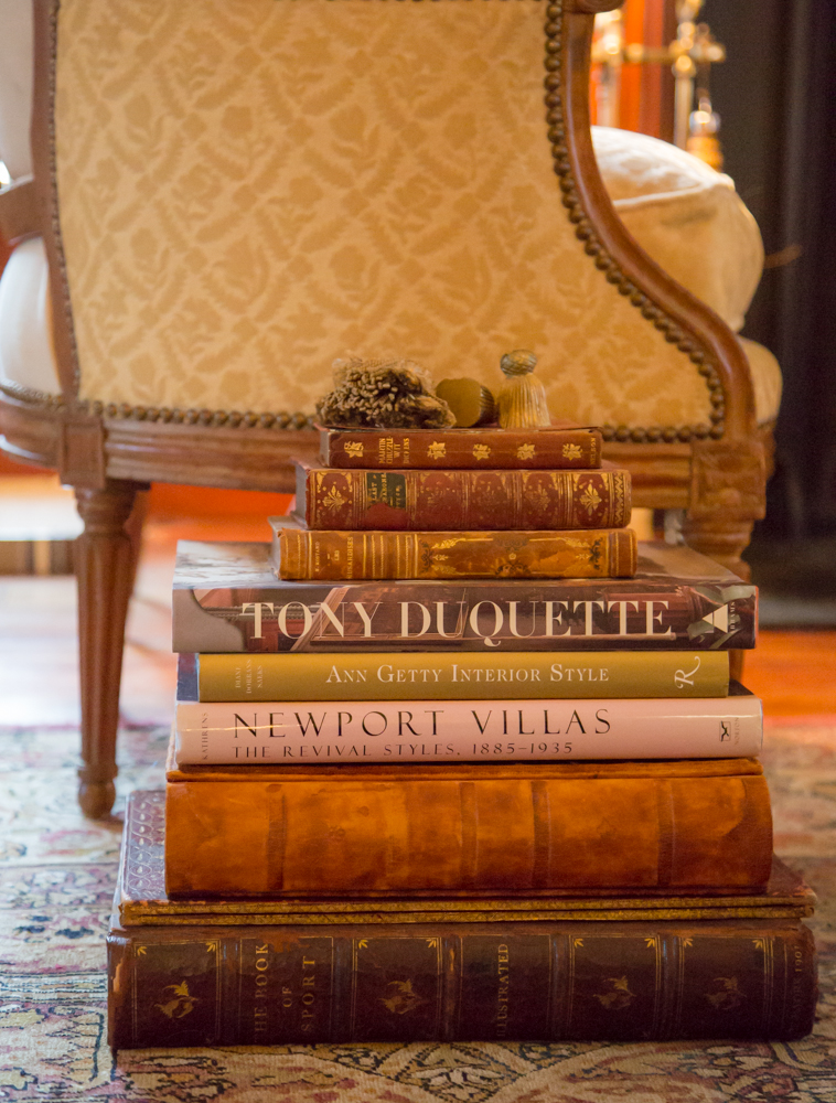 Stack large, substantial books to create a side table. Keep in mind…they aren’t called “coffee table books” for nothing! 